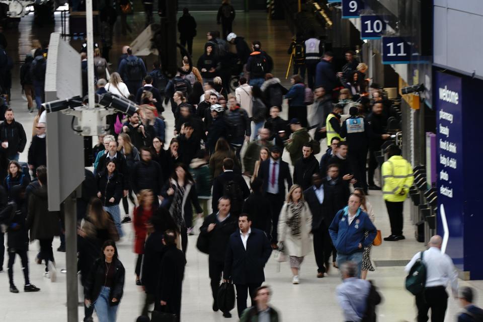 Passengers at Waterloo train station (Aaron Chown/PA Wire)