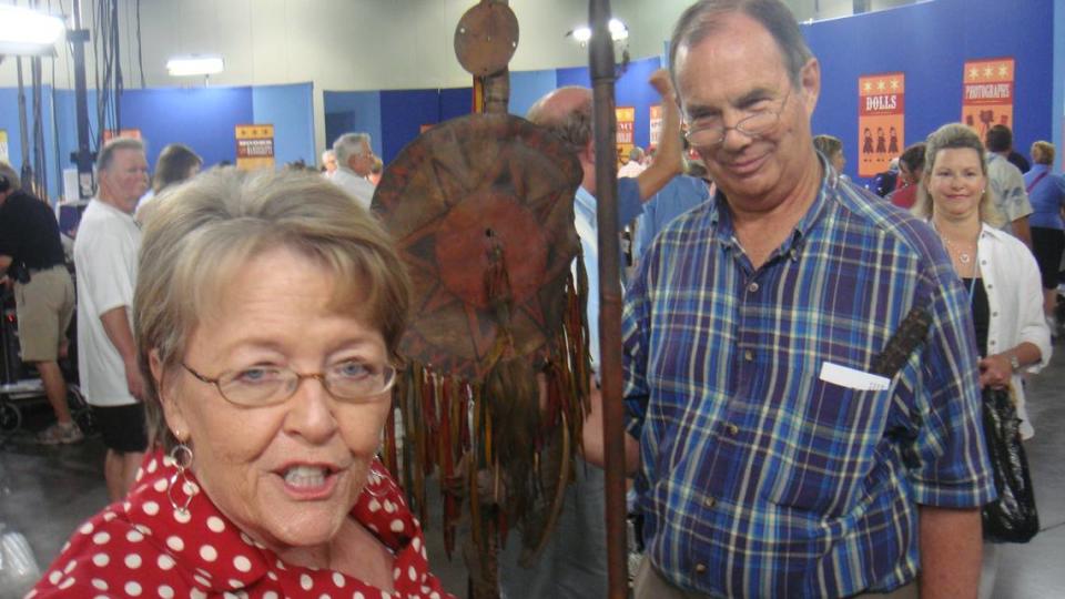 Mary and Robert Baker of Alamance County with their ceremonial tribal spear at the Raleigh Convention Center during the Antique Roadshow visit on Saturday, June 27, 2009. Human hair but not a scalp on the spear.