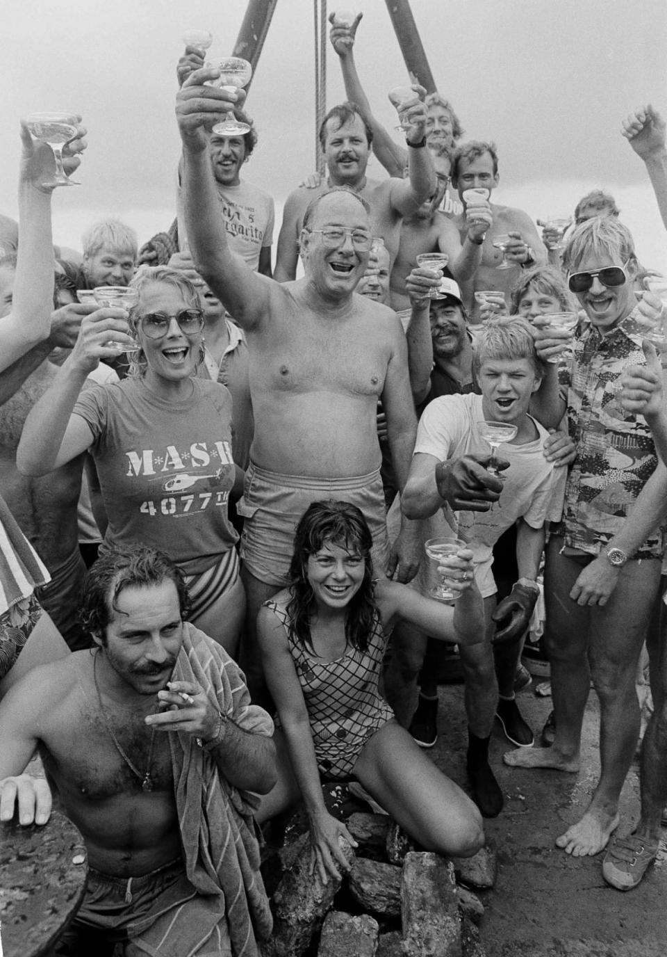 <div class="inline-image__caption"><p>Mel Fisher—surrounded by members of his company, Treasure Salvors Inc.—raises a glass in Key West, Fla., July 21, 1985. The treasure Fisher found was valued as high as $400 million in silver bars, gold bullion, pieces of eight, copper ingots, as well as the unrecorded wealth carried by the 289 people aboard the galleon Nuestra Senora de Atocha, which sank in a hurricane in September 1622.</p></div> <div class="inline-image__credit">AP Photo/Joe Skipper</div>