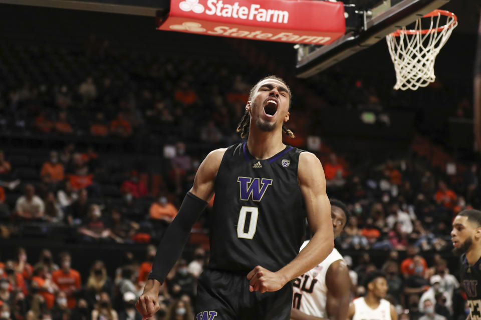 Washington's Emmitt Matthews Jr. (0) cheers after a basket against Oregon State during the second half of an NCAA college basketball game Thursday, Jan. 20, 2022, in Corvallis, Ore. Washington won 82-72. (AP Photo/Amanda Loman)