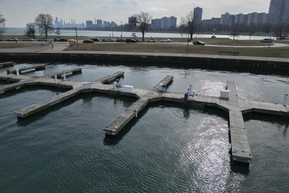 Sunlight reflects off of Lake Michigan at Montrose Harbor on an unseasonably warm day, Tuesday, Feb. 27, 2024, in Chicago. (AP Photo/Erin Hooley)