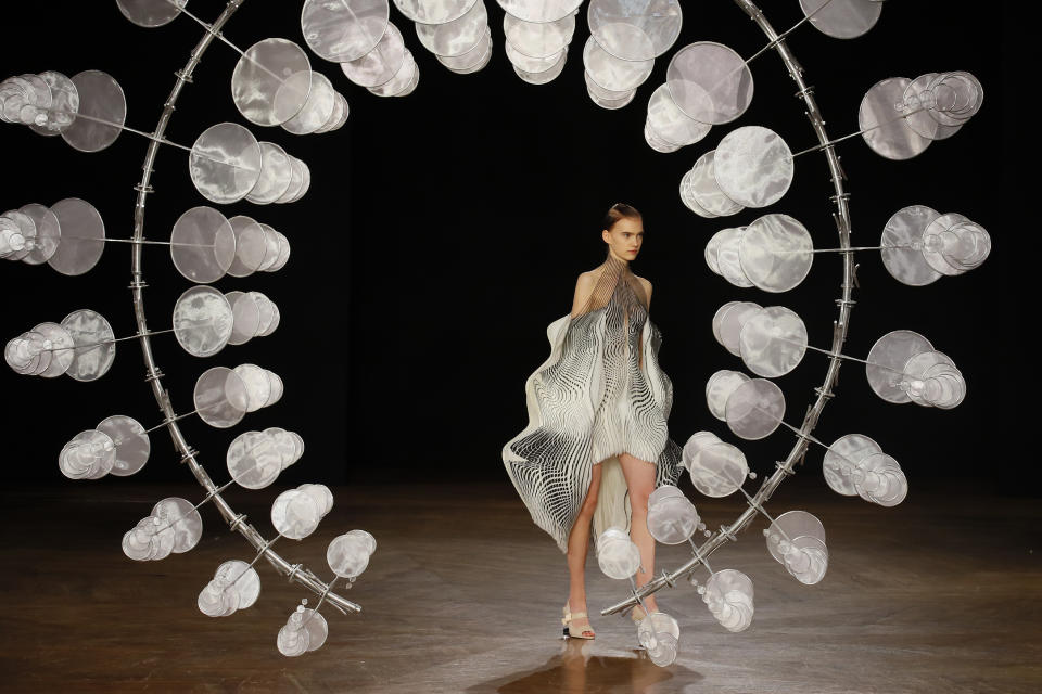 A model wears a creation for Iris van Herpen Haute Couture Fall-Winter 2019-2020 fashion collection presented in Paris, Monday, July 1 2019. (AP Photo/Francois Mori)