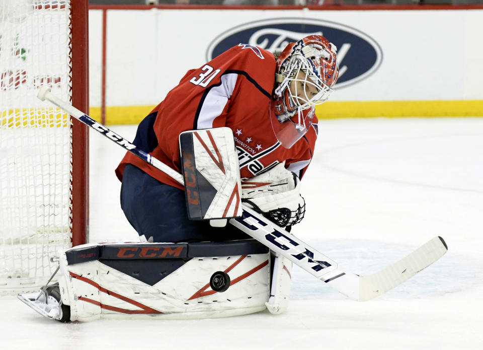 Washington Capitals goaltender Ilya Samsonov stops the puck during the second period of an NHL hockey game against the New Jersey Devils, Friday, Dec. 20, 2019, in Newark, N.J. (AP Photo/Bill Kostroun)