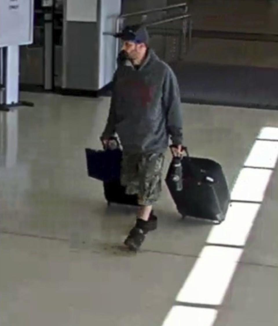 This airport surveillance camera image released in an FBI affidavit shows alleged suspect Marc Muffley at Lehigh Valley International Airport in Allenstown, Pa. on Monday, Feb. 27, 2023. Muffley was arrested Monday after an explosive was found in a bag checked onto a Florida-bound flight, federal authorities said.