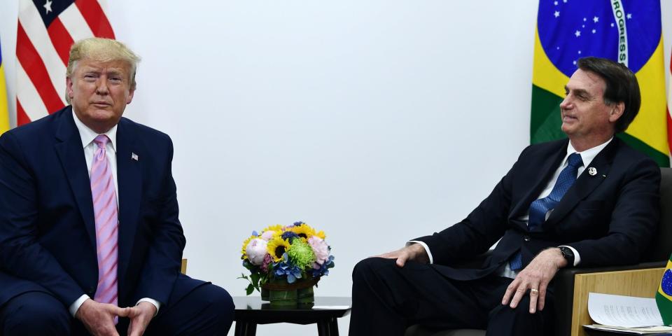 Brazil's President Jair Bolsonaro (R) meets with US President Donald Trump during a bilateral meeting on the sidelines of the G20 Summit in Osaka on June 28, 2019. (Photo by Brendan Smialowski / AFP) (Photo credit should read BRENDAN SMIALOWSKI/AFP via Getty Images)