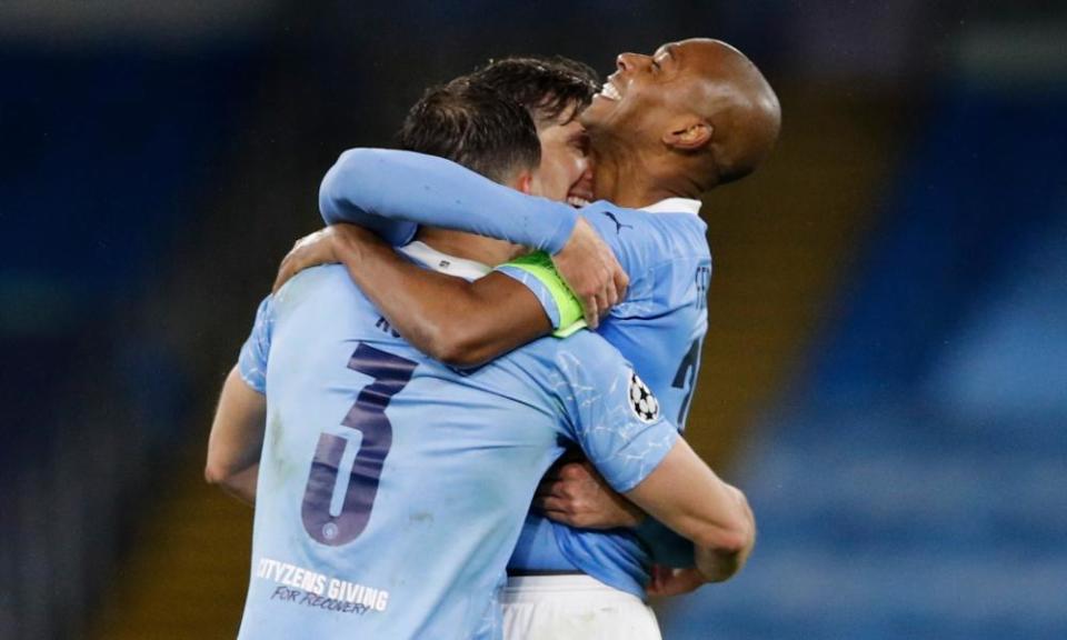 Manchester City’s players celebrate their victory over PSG