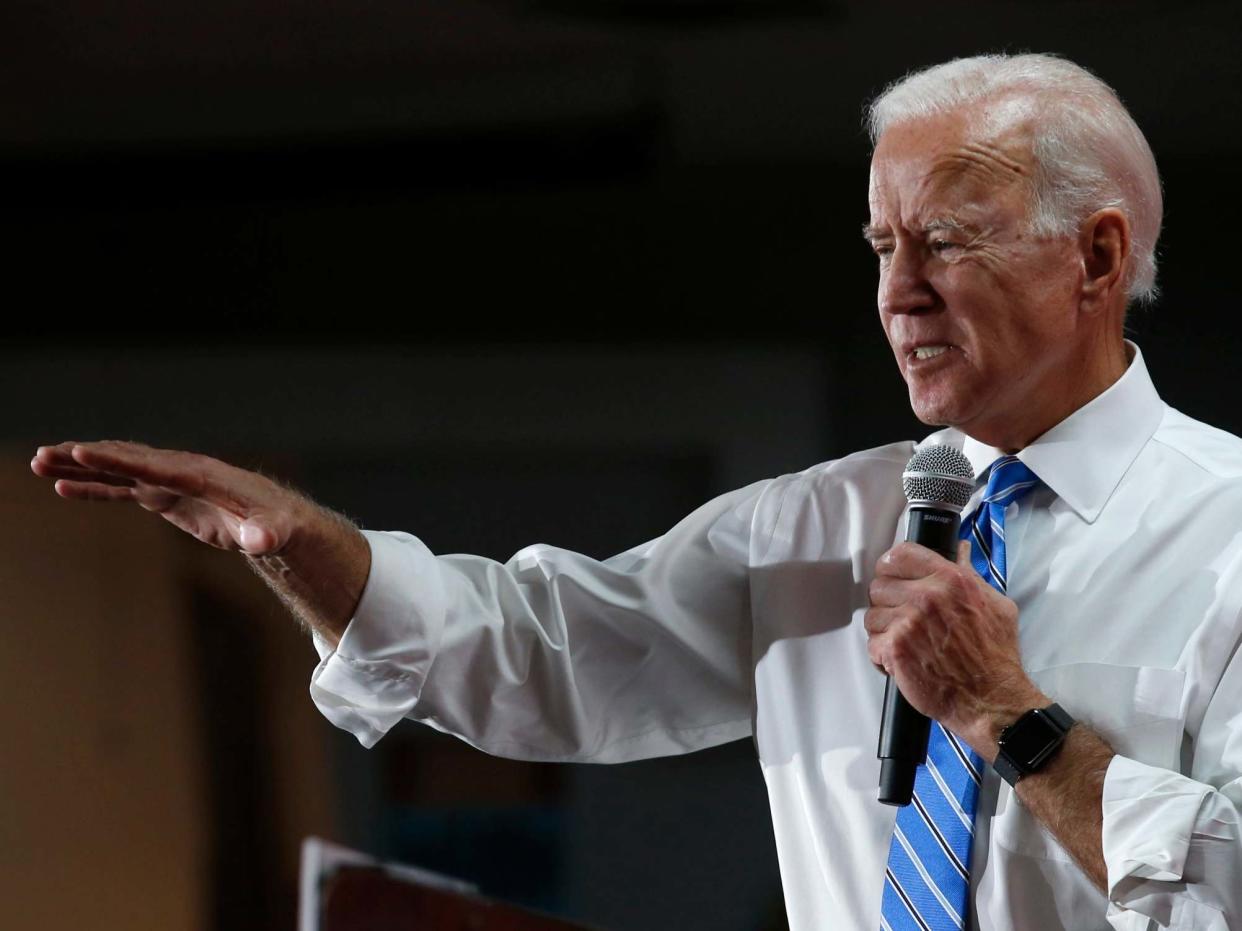 Democratic candidate and former vice president Joe Biden responds to a question during town hall meeting: AP