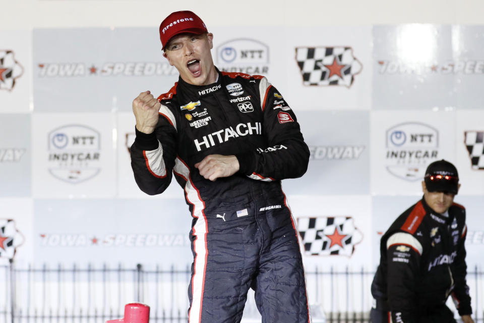 Josef Newgarden celebrates after winning the IndyCar Series auto race Sunday, July 21, 2019, at Iowa Speedway in Newton, Iowa. (AP Photo/Charlie Neibergall)