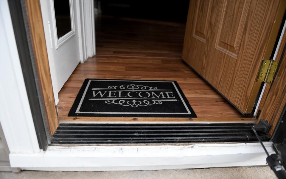 A welcome mat sits at the entrance to a North Canton home that was recently sold.