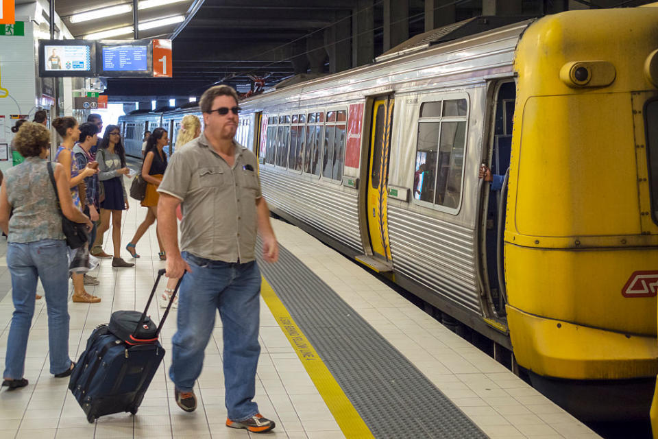 Passengers board a train at Fortitude Valley Station in Brisbane. Source: Getty