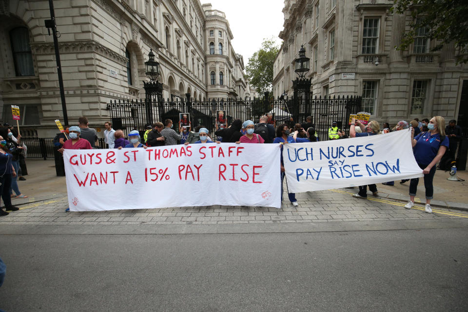 NHS workers outside Downing Street, London, attending a rally to demand the government give them a 15 per cent pay rise.