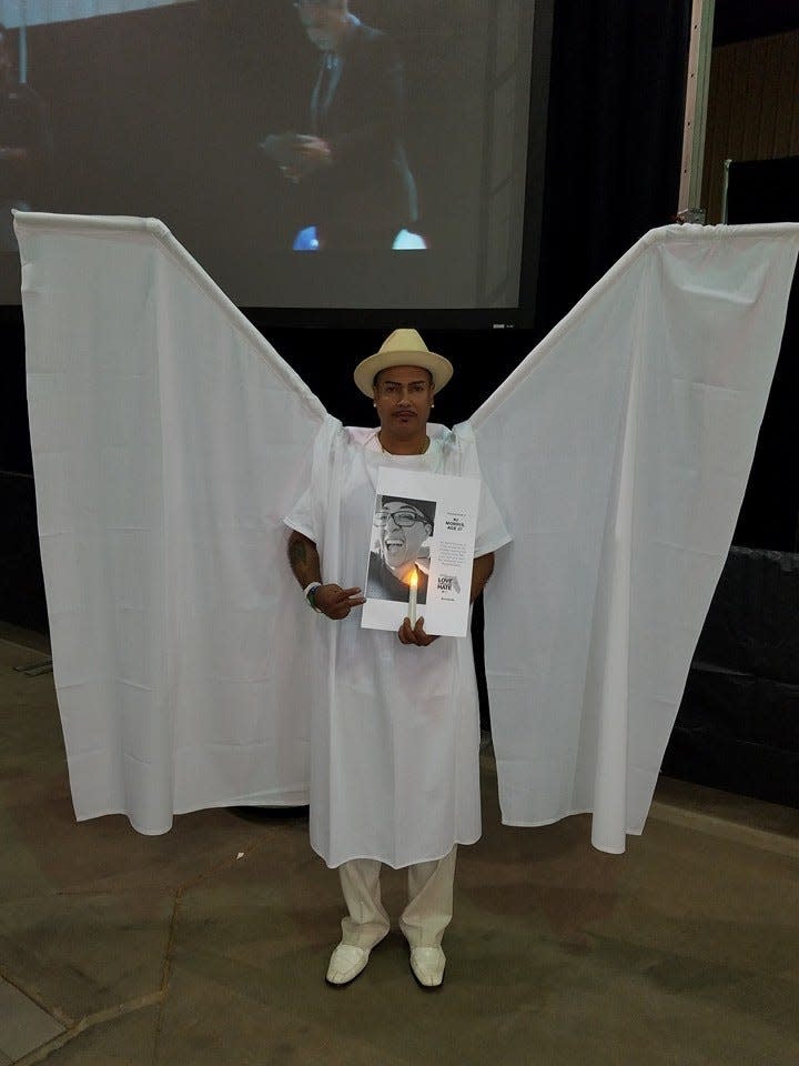 Orlando Torres at a Pulse nightclub remembrance ceremony one year after the attack that killed 49 people in Orlando, Fla. Torres was one of 49 people who dressed as angels to honor those killed in the attack.