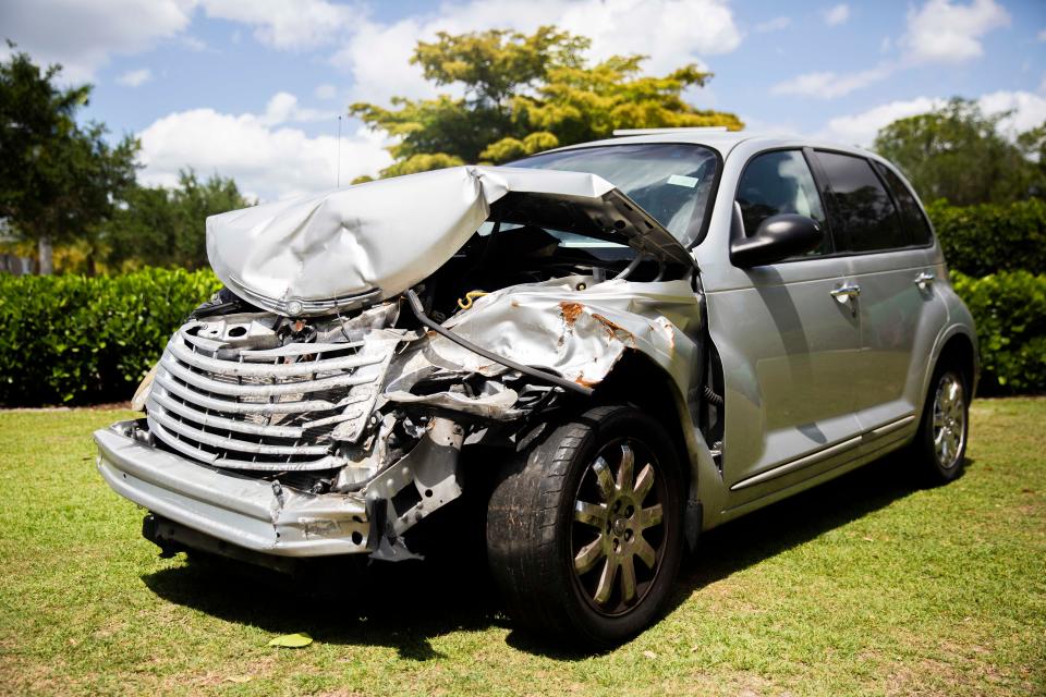 The Collier County Sheriff's Office's display of a car from a distracted driving crash to remind drivers to focus on the road on Friday, April 22, 2022 at Mercato in Naples, Fla.