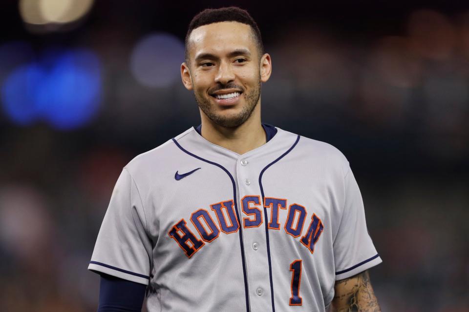 Houston Astros shortstop Carlos Correa smiles during the fifth inning against the Detroit Tigers at Comerica Park in Detroit, June 24, 2021.