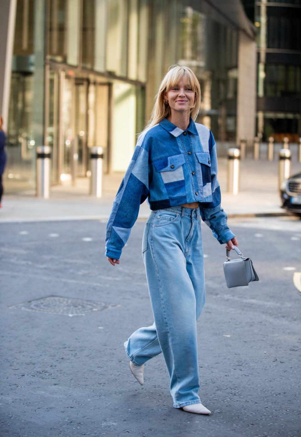 Jeanette Friis Madsen is seen wearing denim jeans and a coordinating patchwork denim jacket outside David Koma. [Photo: Getty Images]