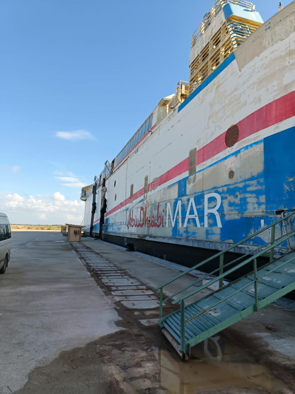 While the exterior of the ferries bears the blue and red colour scheme of boats from the 1990s, the "Abu Dhabi MAR" signage comes from the time the three ships were owned by the United Arab Emirates in the 2010s. 