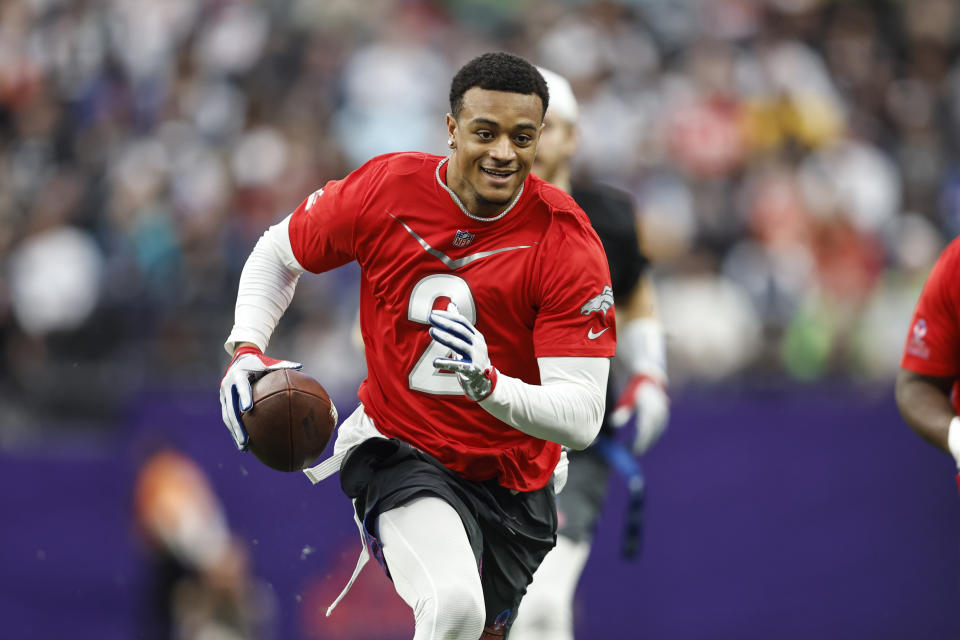 LAS VEGAS, NEVADA - FEBRUARY 05: LAS VEGAS, NEVADA - FEBRUARY 05: AFC cornerback Patrick Surtain II #2 of the Denver Broncos intercepts the ball and runs during an NFL Pro Bowl football game at Allegiant Stadium on February 05, 2023 in Las Vegas, Nevada. (Photo by Michael Owens/Getty Images)