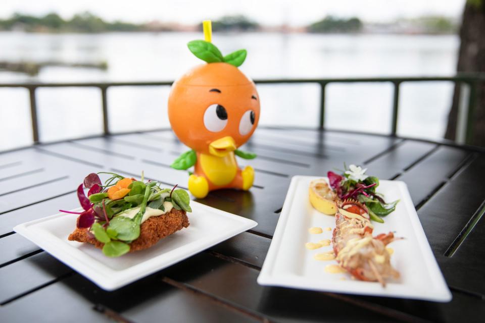 Highlights from the Citrus Blossom marketplace in the Taste of EPCOT International Food & Wine Festival include, from left, Crispy Citrus Chicken with Orange Aioli and Baby Greens, an Orange Cream Shake in a Souvenir Orange Bird Sipper Cup and Lobster Tail with Meyer Lemon Emulsion and Grilled Lemon.