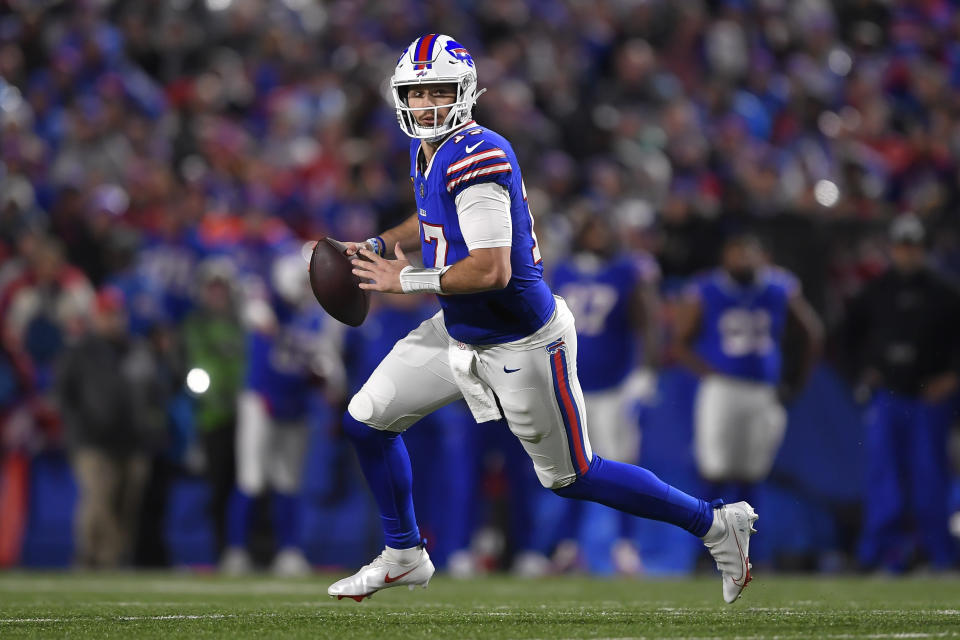 FILE - Buffalo Bills quarterback Josh Allen (17) looks to pass during the first half of an NFL football game against the Dallas Cowboys in Orchard Park, N.Y., Sunday, Dec. 17, 2023. Josh Allen is a finalist for The Associated Press 2023 NFL Most Valuable Player award. The winners will be announced at NFL Honors on Feb. 8.(AP Photo/Adrian Kraus)