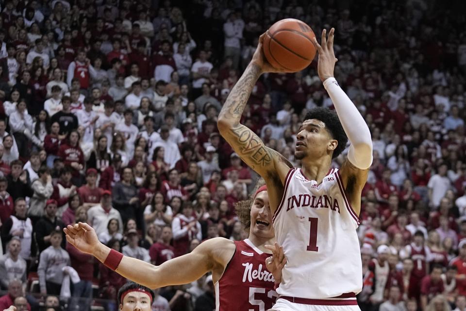 Indiana center Kel'el Ware (1) shoots against Nebraska forward Josiah Allick (53) during the second half of an NCAA college basketball game, Wednesday, Feb. 21, 2024, in Bloomington, Ind. (AP Photo/Darron Cummings)