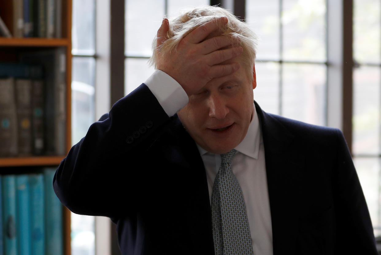 Boris Johnson, a leadership candidate for Britain's Conservative Party, gestures during his visit at Wisley Garden Centre in Surrey, Britain, June 25, 2019. REUTERS/Peter Nicholls