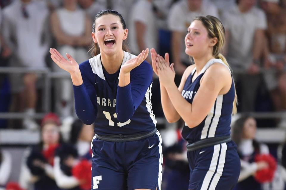Farragut's Avery Strickland (13) cheers in the final seconds of a Class AAAA semifinal game between Farragut and Cookeville at the Murphy Center in Murfreesboro, Friday, March 11, 2022. Farragut defeated Cookeville.