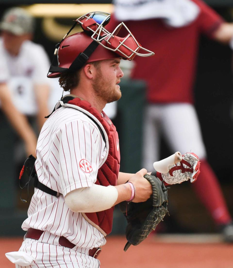 April 19, 2024; Tuscaloosa, AL, USA; Alabama catcher Mac Guscette (9) gets ready to receive a pitch at Sewell-Thomas Stadium in the first game of a double header Friday with Texas A&M.