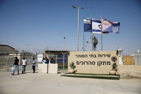 African migrants walk out after being released from Saharonim Prison in the Negev desert, Israel April 15, 2018. REUTERS/Amir Cohen