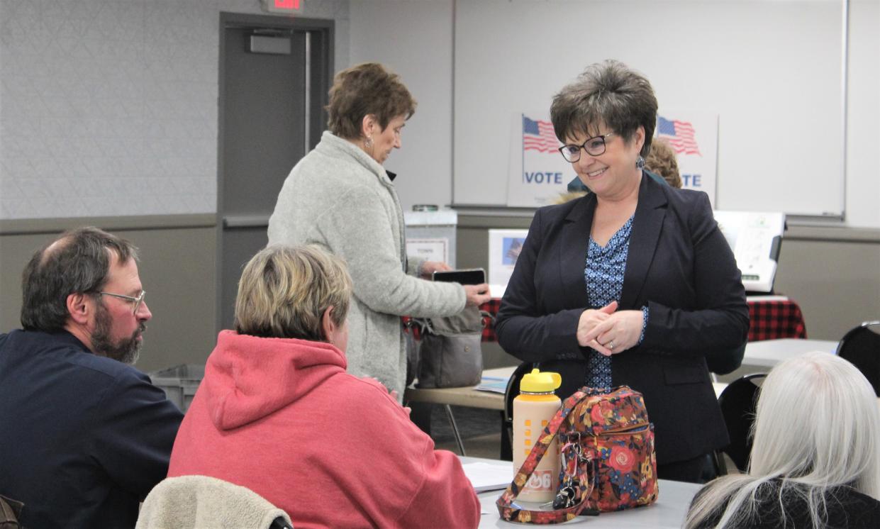 New Cascade County Election Administrator Terry Thompson (standing facing toward camera) chats with a candidate for County Election Judge during a training session last Thursday