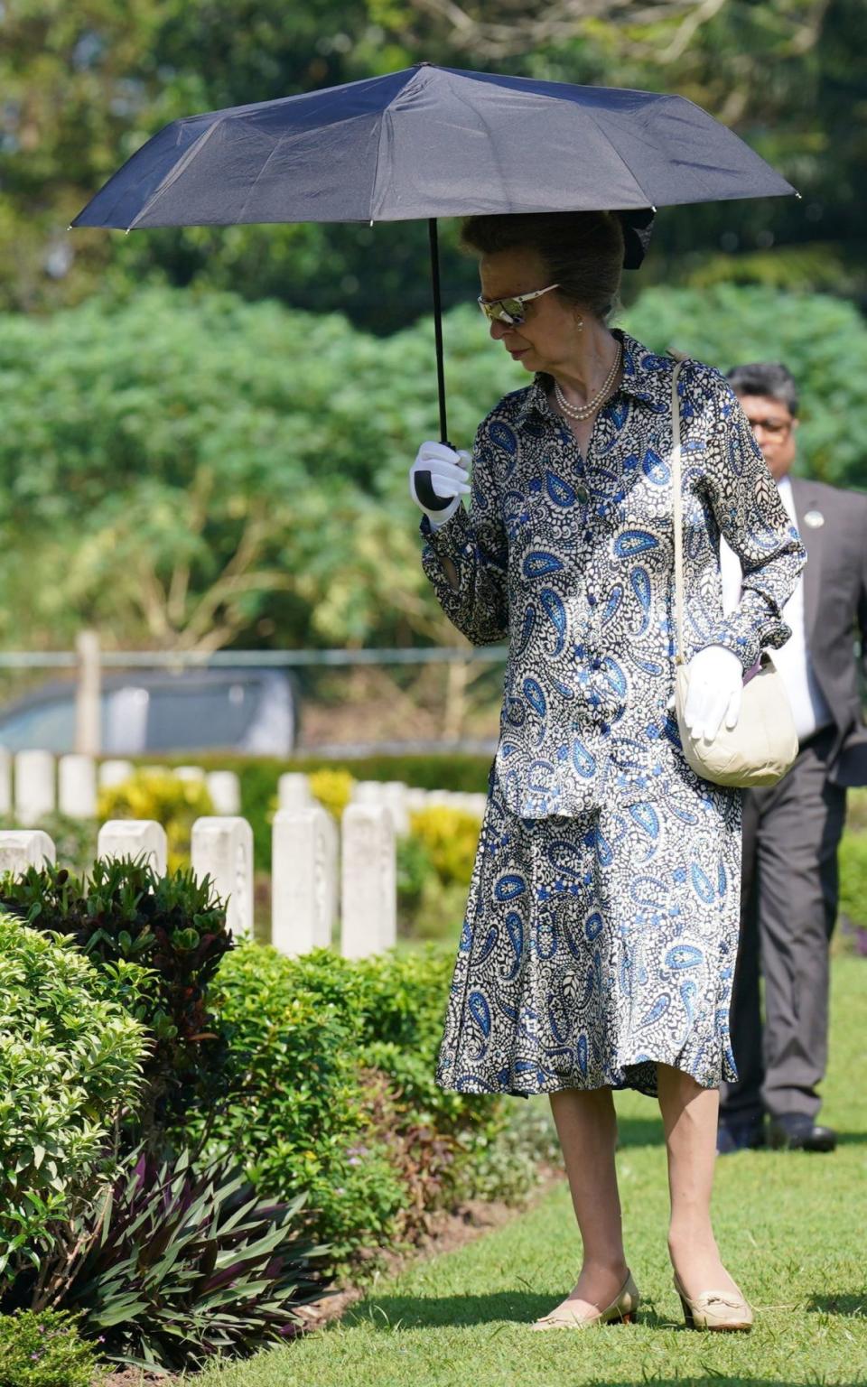 The Princess Royal wearing a paisley Cotswolds Collections co-ord during a visit to Commonwealth War Graves Commission Jawatte Cemetery in Colombo, Sri Lanka, as part of day three of a visit to mark 75 years of diplomatic relations between the UK and Sri Lanka