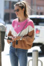 <p>Alessandra Ambrosio was seen wearing a pink, white and brown sweater in Los Angeles.</p>