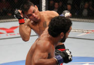 BELO HORIZONTE, BRAZIL - JUNE 23: (R-L) Hugo "Wolverine" Viana punches John Teixeira during their UFC 147 featherweight bout at Estadio Jornalista Felipe Drummond on June 23, 2012 in Belo Horizonte, Brazil.