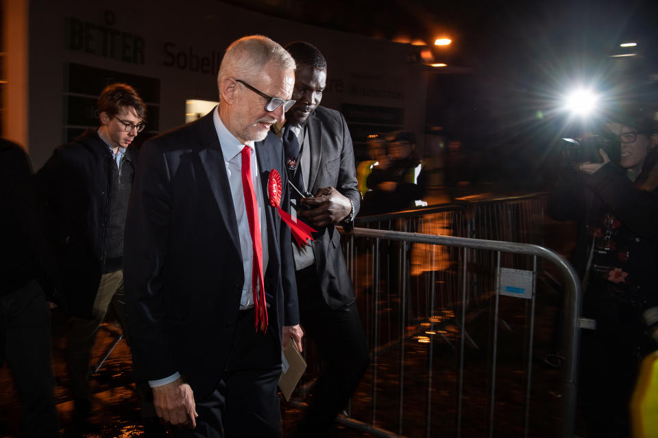 LONDON, ENGLAND - DECEMBER 13: Jeremy Corbyn, leader of the Labour Party, leaves the vote count in his Islington North constituency on December 13, 2019 in London, England. Corbyn, who has held the Islington North seat since 1983, retained his seat but is expected to step down as leader following his party's decisive defeat by the Conservatives and Prime Minister Boris Johnson. The Prime Minister called the first UK winter election for nearly a century in an attempt to gain a working majority to break the parliamentary deadlock over Brexit. The election results from across the country are being counted overnight and an overall result is expected in the early hours of Friday morning. (Photo by Leon Neal/Getty Images)