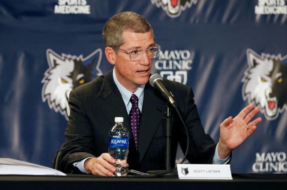 Scott Layden addresses the media after he was introduced as the new general manager of the Minnesota Timberwolves NBA basketball team Tuesday, April 26, 2016, in Minneapolis. Also introduced was new head coach Tom Thibodeau. (AP Photo/Jim Mone)