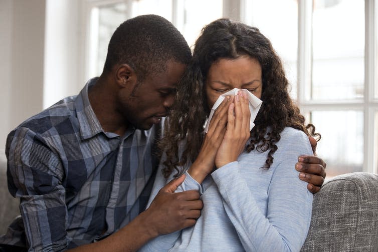 <span class="caption">Sensitive people can thank their genes.</span> <span class="attribution"><a class="link " href="https://www.shutterstock.com/image-photo/supportive-african-husband-embracing-crying-wife-1283870137" rel="nofollow noopener" target="_blank" data-ylk="slk:fizkes/ Shutterstock;elm:context_link;itc:0;sec:content-canvas">fizkes/ Shutterstock</a></span>