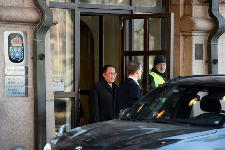 North Korean Foreign Minister Ri Yong Ho (L) leaves the Swedish goverment building Rosenbad in central Stockholm, where he was to remain for further talks with Swedish leaders aiming for a US-North Korea summit