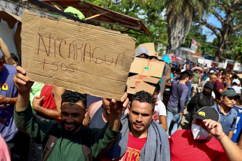 Migrants gather to regularize their migratory situation in COMAR, in Tapachula