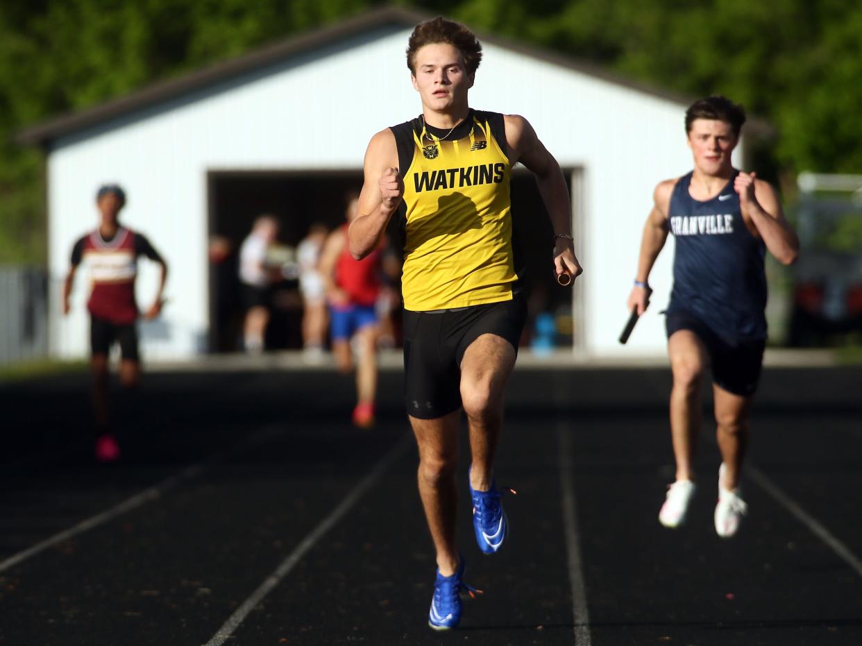 Watkins Memorial's John Apel runs the final leg of the Buckeye Division 800 relay during the Licking County League championships at Heath on Friday, May 10, 2024.