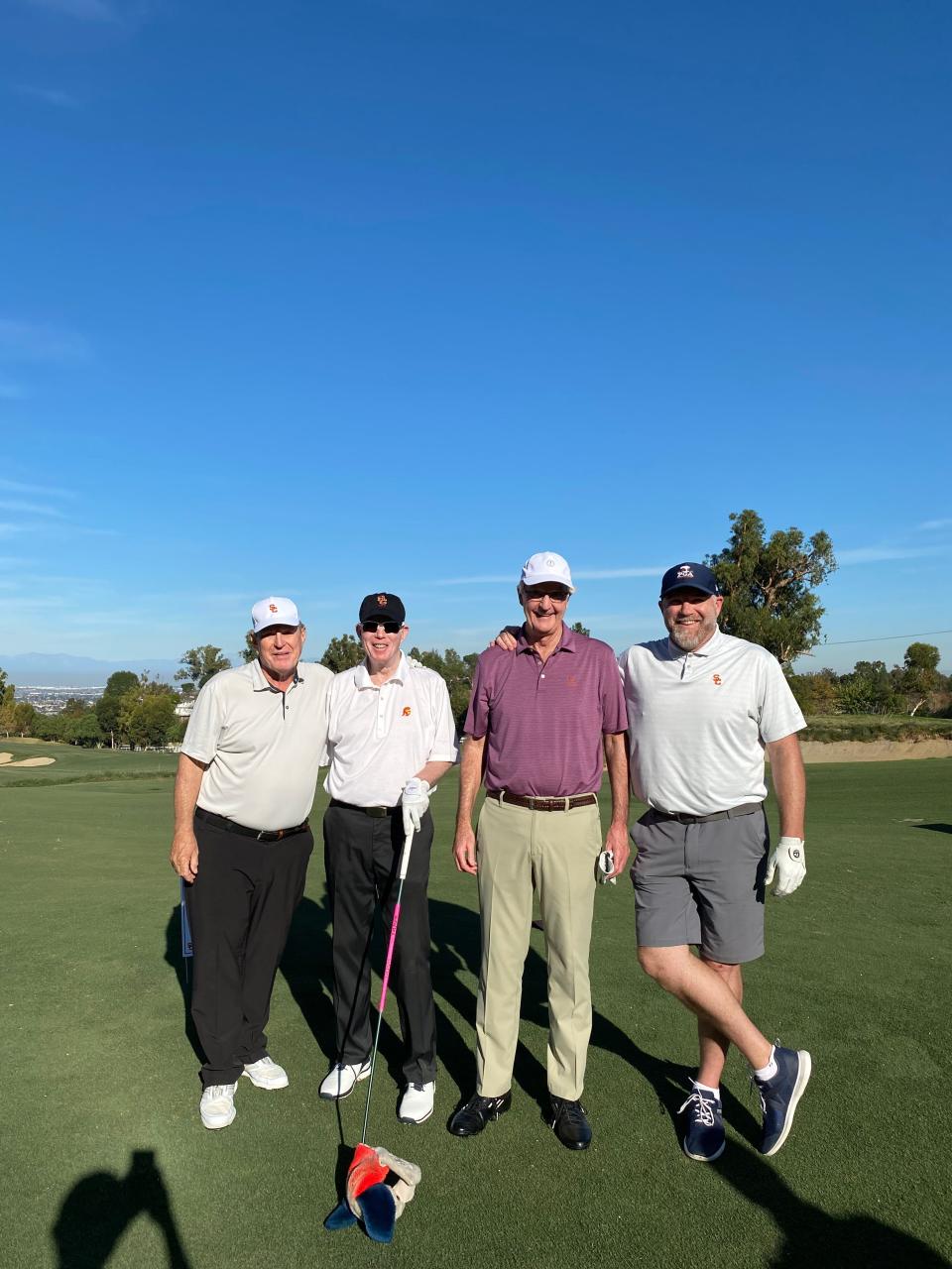 Dick Robinson, Bill Poland, Dave McLeod and Wes Poland get ready for a round of golf.