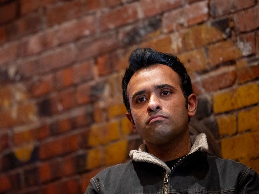 Vivek Ramaswamy arrives to speak to attendees during a campaign stop on on January 14, 2024 in Ames, Iowa