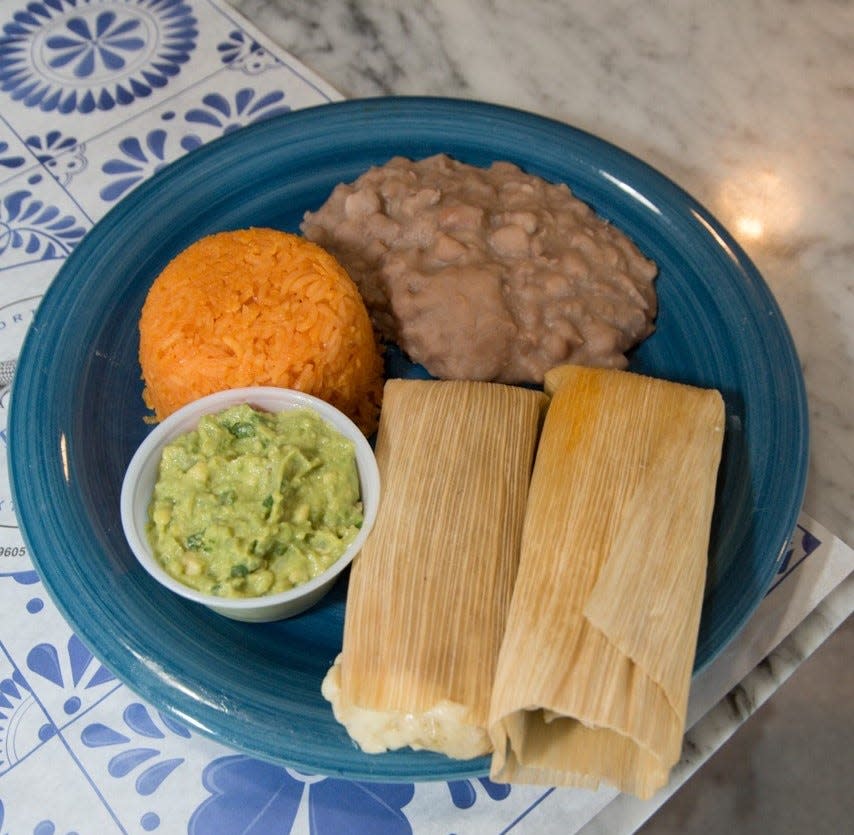 Mexican tamales, beans, rice and guacamole are offered at Sierra Madre tortilla factory and shop in Lake Worth Beach.
