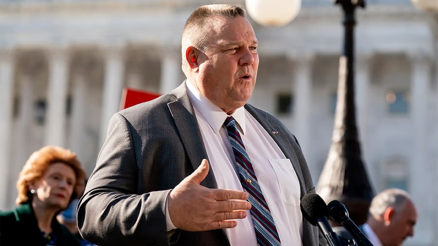 Sen. Jon Tester (D-Mont.) addresses reporters during a press conference on Wednesday, December 1, 2021 to discuss climate change provisions in the Build Back Better Act.