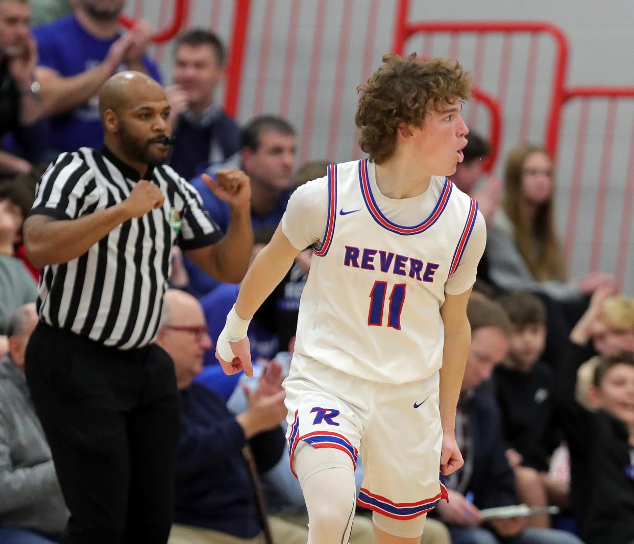 Revere's Conner Groce celebrates after a first-half shot against Barberton, Tuesday, Feb. 13, 2024.