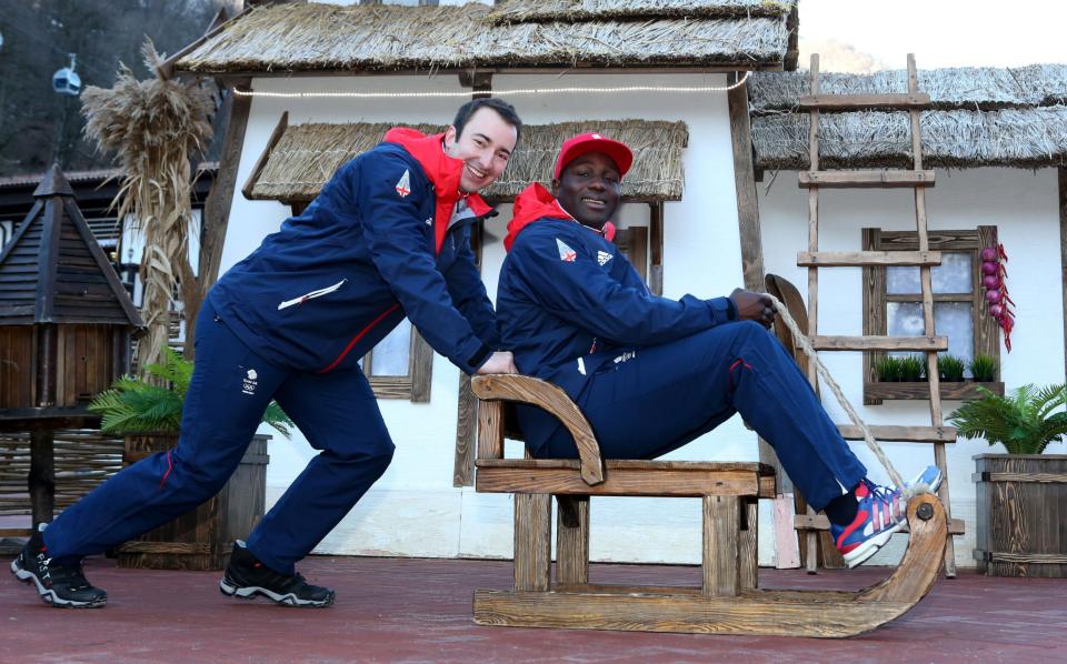 reat Britains two man Bobsleigh team l-r John Baines and Lamin Deen sit in a sledge during a photocall in Rosa Khutor during the 2014 Sochi Olympic Games in Krasnaya Polyana, Russia - PA