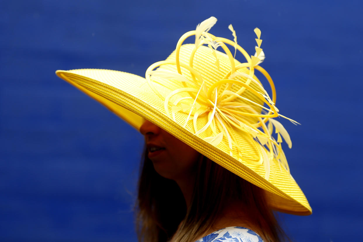 LOUISVILLE, KENTUCKY - MAY 04: A woman wearing a festive hat looks on prior to the 145th running of the Kentucky Derby at Churchill Downs on May 04, 2019 in Louisville, Kentucky. (Photo by Michael Reaves/Getty Images)