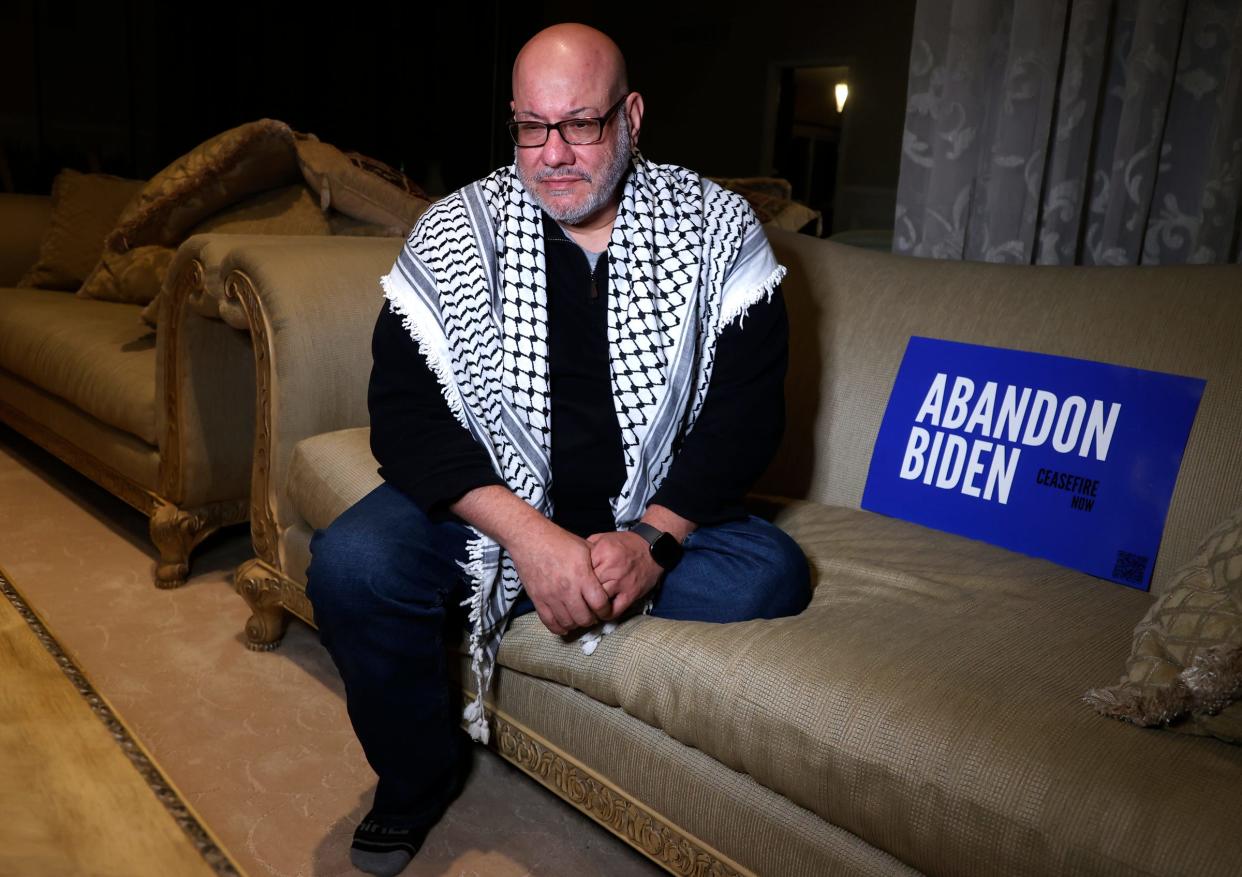 Mohammad Enayah poses in his West Bloomfield, Michigan home. Enayah is a supporter of the Abandon Biden campaign and had multiple members of his family killed by the Israeli strikes in Gaza in the fall of 2023.