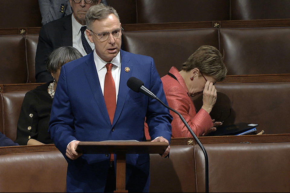 Rep. Scott Peters, D-Calif., speaks as the House of Representatives debates the articles of impeachment against President Donald Trump at the Capitol in Washington, Wednesday, Dec. 18, 2019. (House Television via AP)