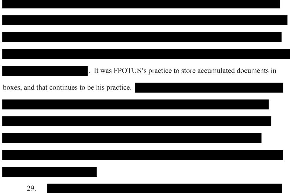 A portion of the affidavit in support of a warrant to search former President Donald Trump's Mar-a-lago estate in Palm Beach, Fla., released by the Justice Department, is photographed July 5, 2023. The Justice Department disclosed some of the previously blacked-out portions of a warrant application it submitted last year to gain authorization to search Trump's Florida property for classified documents. (AP Photo/Jon Elswick)