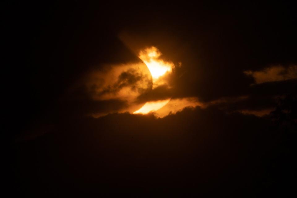 A eclipsed sun rises over Tobermory on June 10, 2021 in Ontario, Canada.