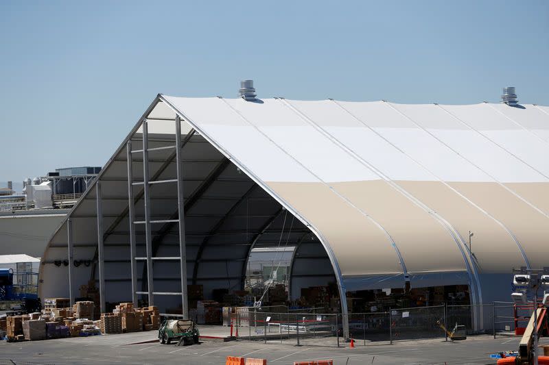 FILE PHOTO: A tent is seen at the Tesla factory in Fremont, California, U.S. June 22, 2018. Picture taken June 22, 2018. REUTERS/Stephen Lam/File Photo